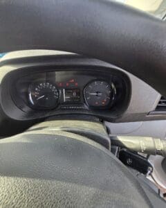 Diesel dashboard with DPF and engine management warning lights illuminated