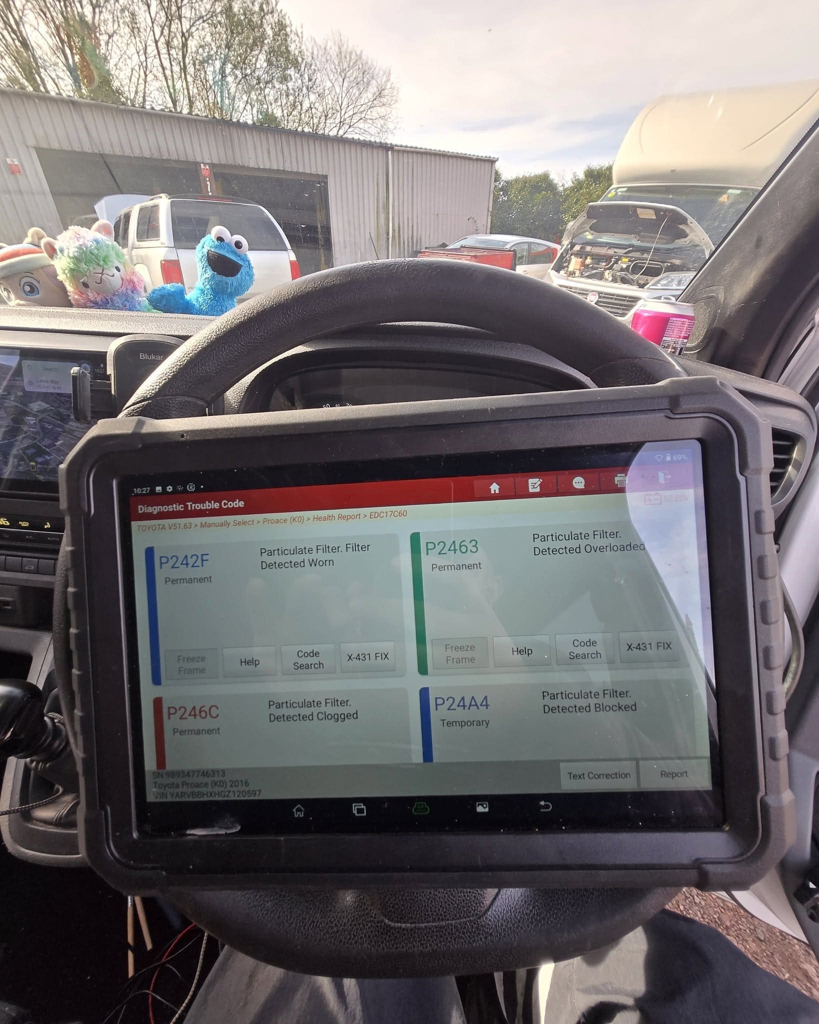 Diagnostic scan showing P2463 particulate filter restriction soot accumulation fault code