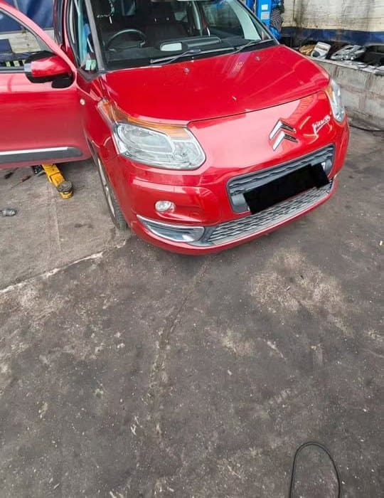 Red Citroën C3 at Pro Remapping after failing its MOT on emissions